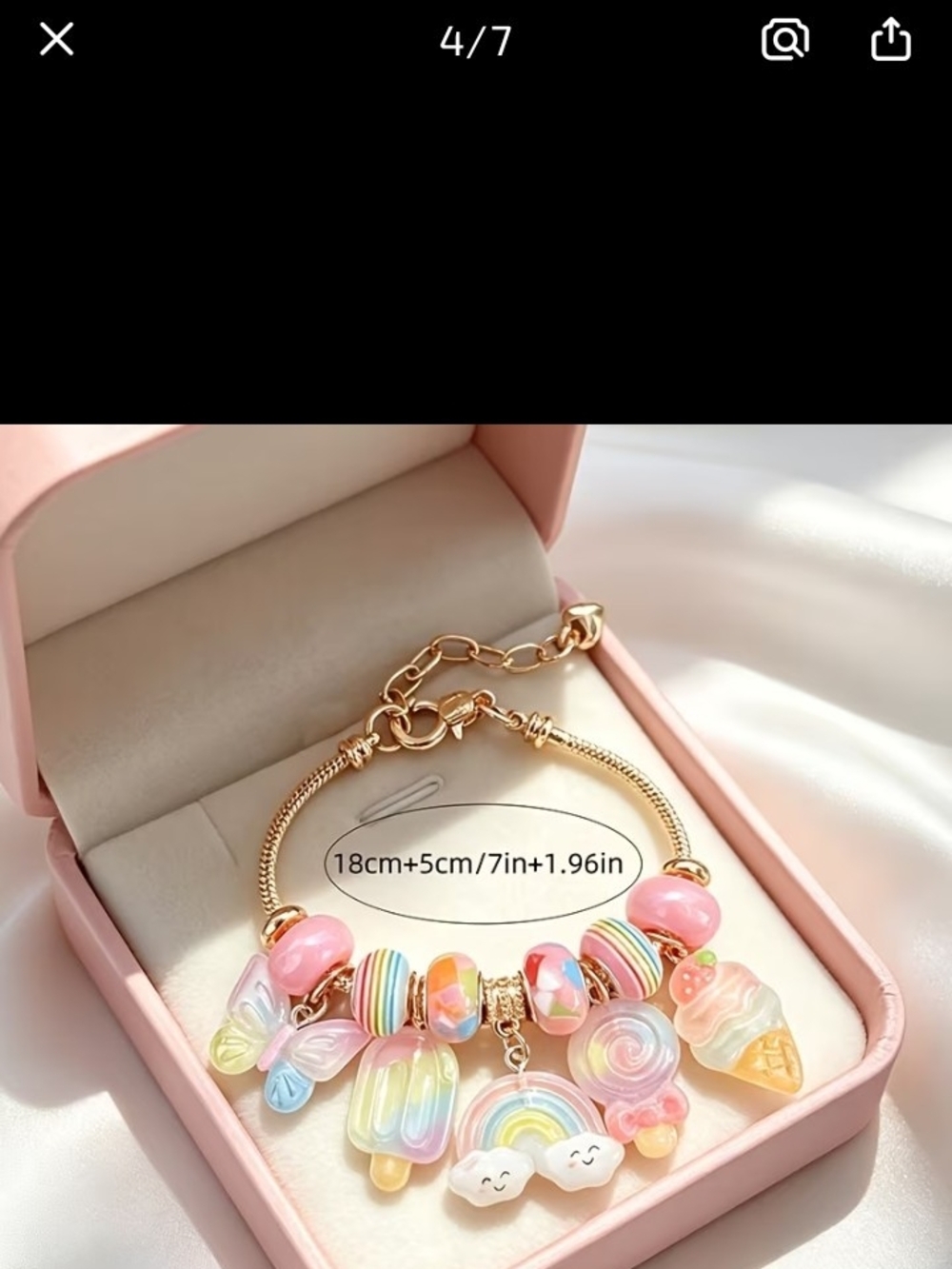 Gold-Tone Rainbow Charm Bracelet with Pastel Pink Accents